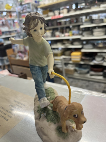 👦🐕
