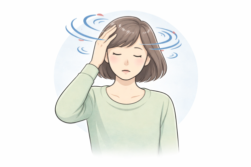 めまいを感じる中年女性.png