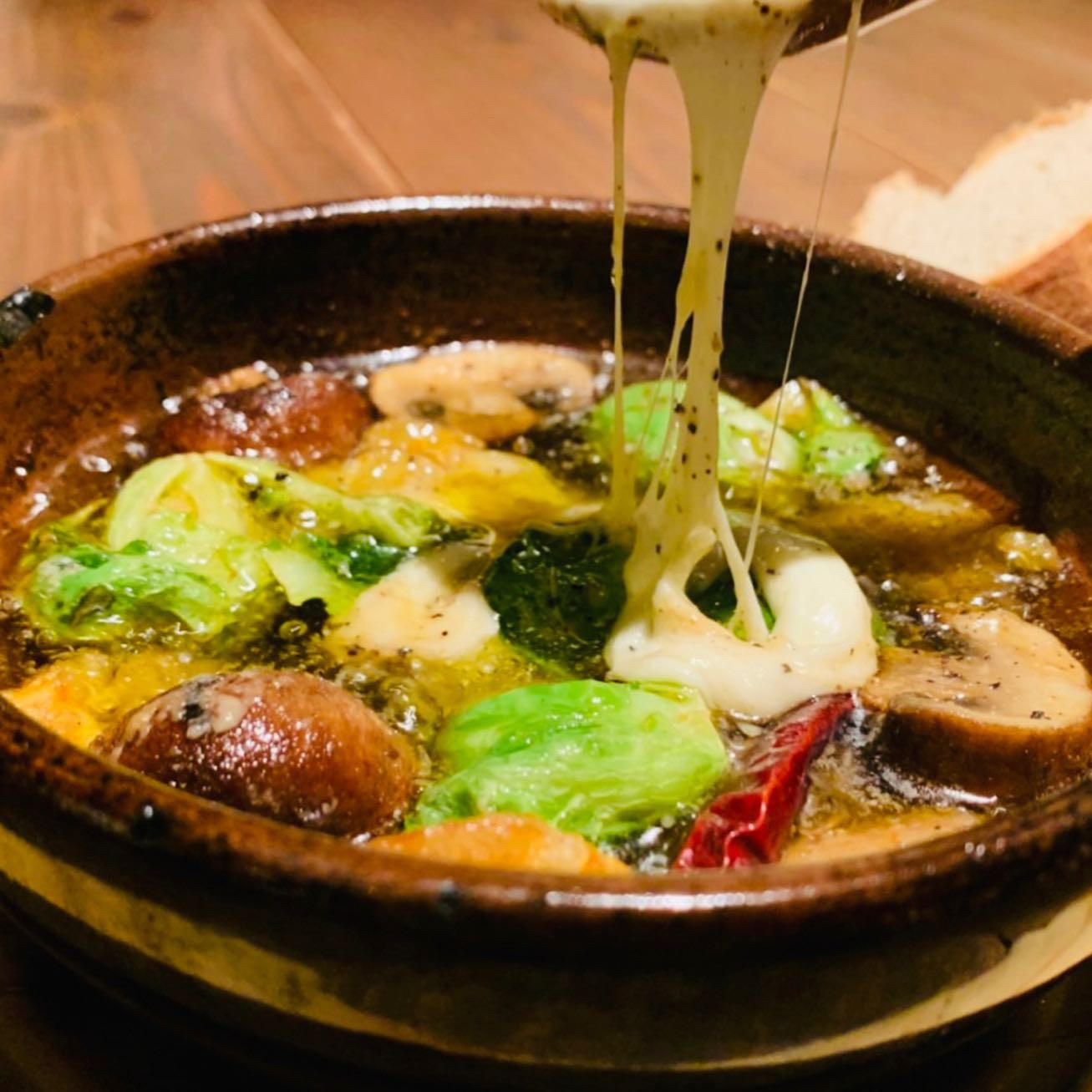 帆立と冬野菜とモッツァレラのアヒージョ