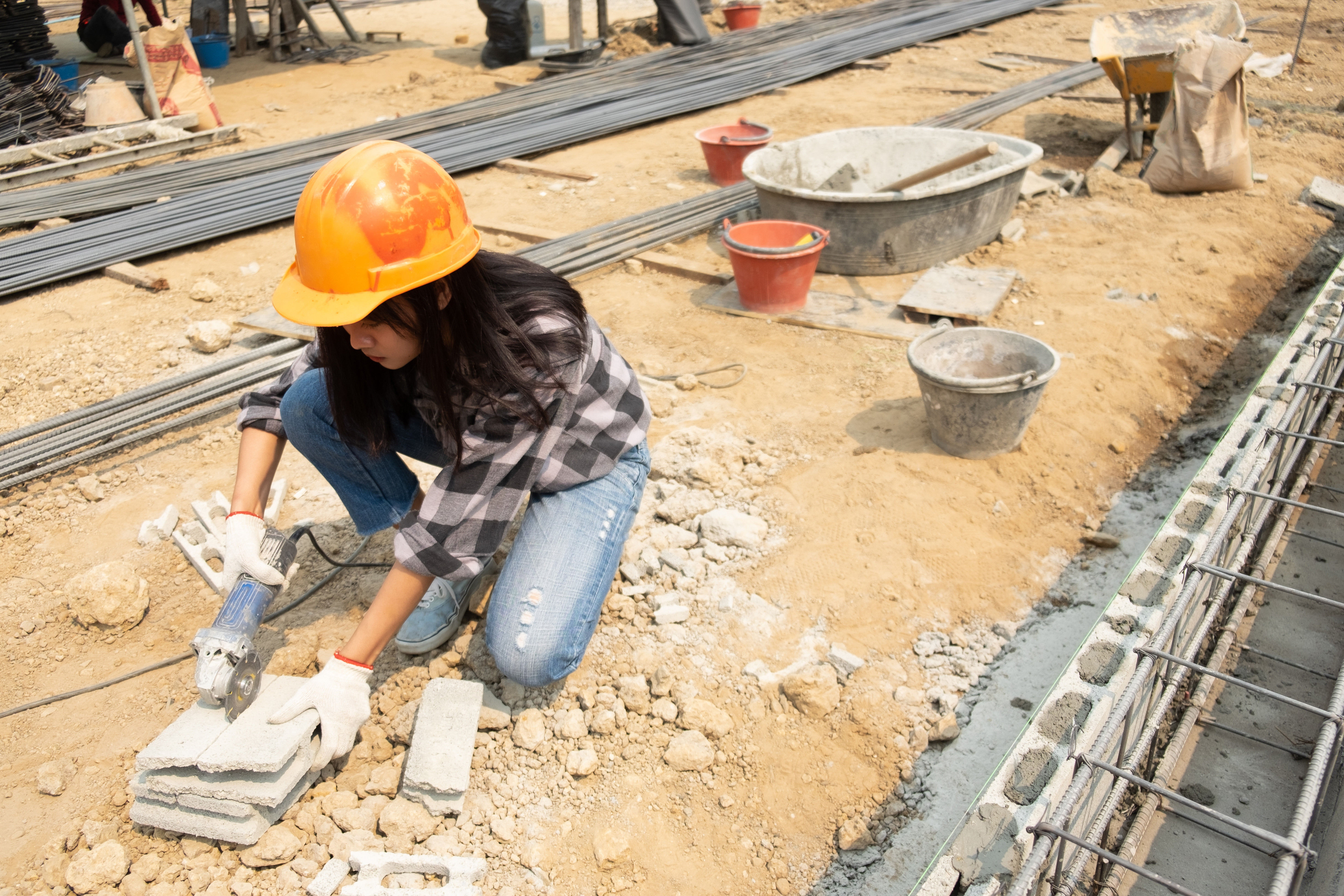 round-saw-hands-builder-work-laying-paving-slabs.jpg