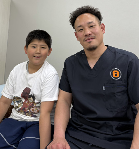軽度の側弯でお父さんと来院