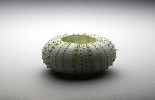 Reminiscense and Space：Sear urchin #4 translucent green orange celadon 1.25%22hx2.5%22d(3x6.5cm).jpg