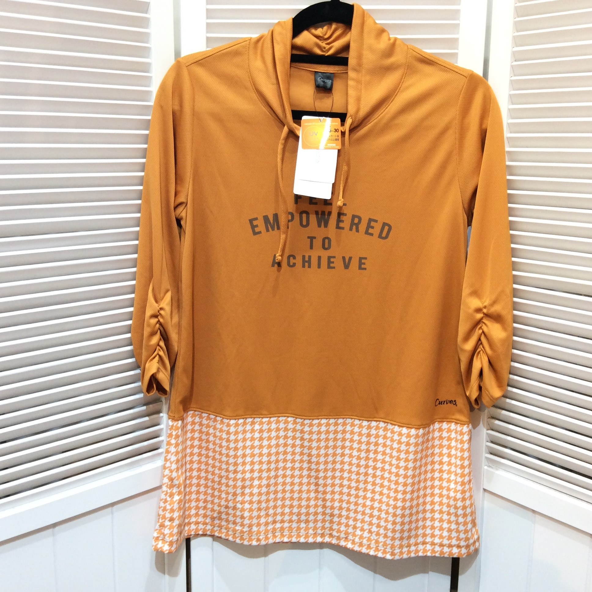 半額値下げ❗️ 新品 カーブス 千鳥柄チュニック Mサイズ  テラコッタ