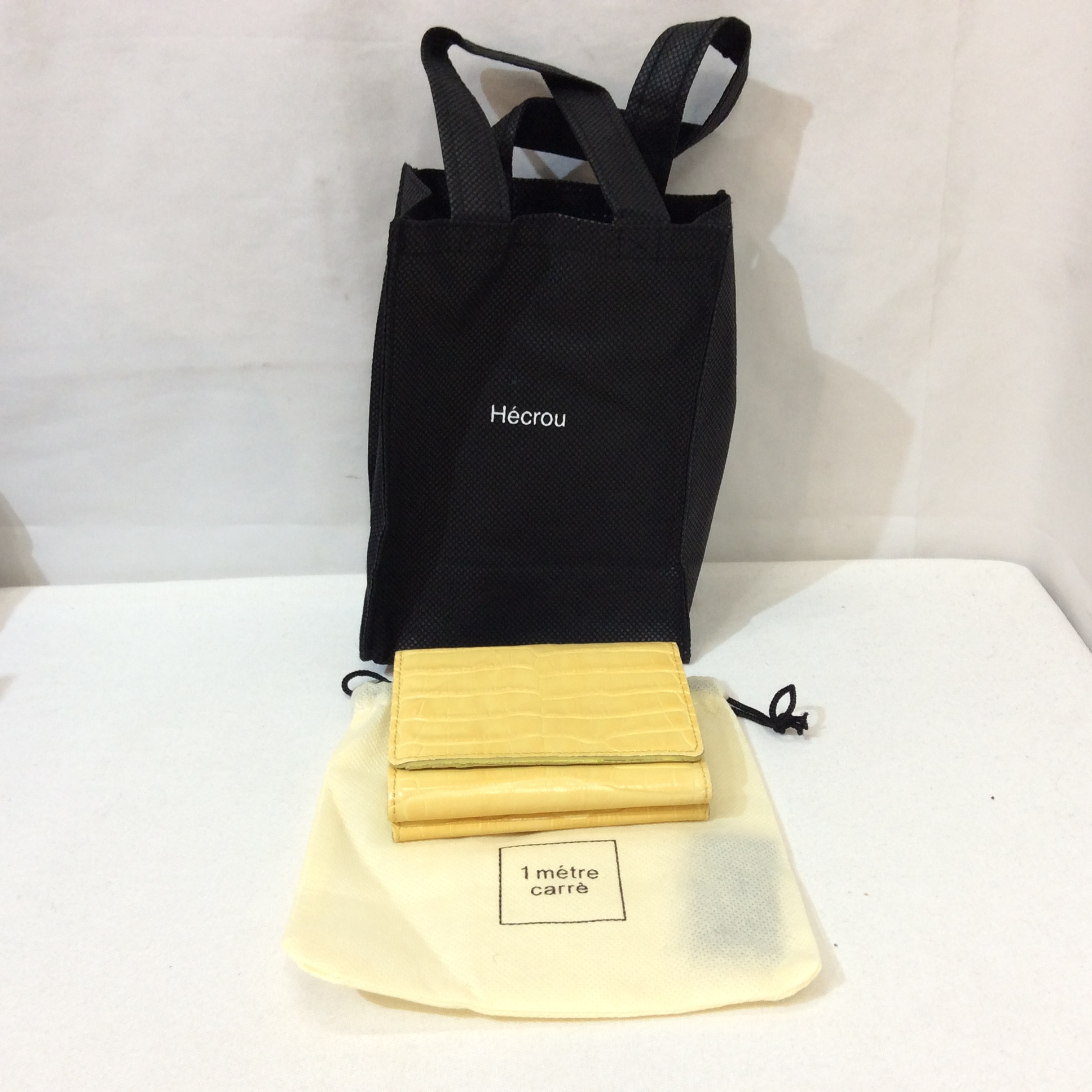 Hecrou レザー型押しコンパクト財布  イエロー