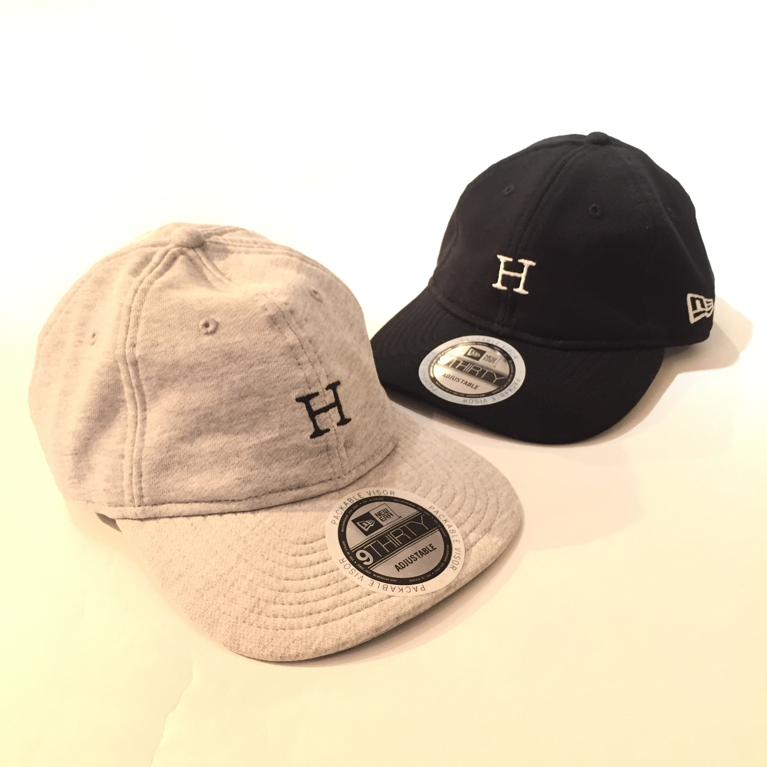 NEW ERA・ハリウッドランチマーケット Hエンブロイダリーパッカブル