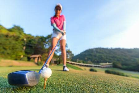 91670053-close-up-of-golf-ball-before-a-women-tee-off-in-the-ground-evening-time-lifestyle-concept.jpg