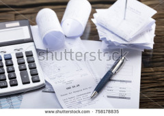 stock-photo-elevated-view-of-calculator-and-pen-on-receipt-in-office-758178835.jpg