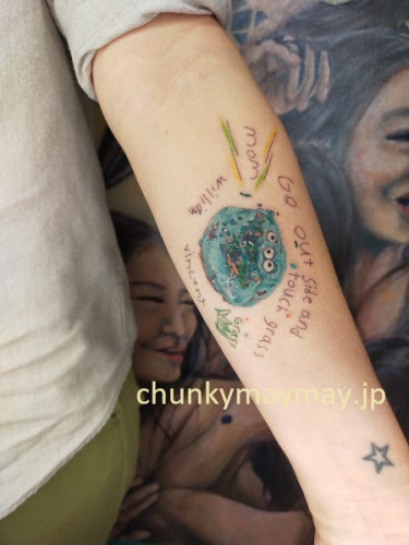 お客様のお子さんのてづくりドーナッツと字