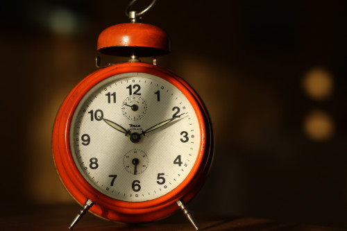 Canva - Red Alarm Clock at 10_11.jpg